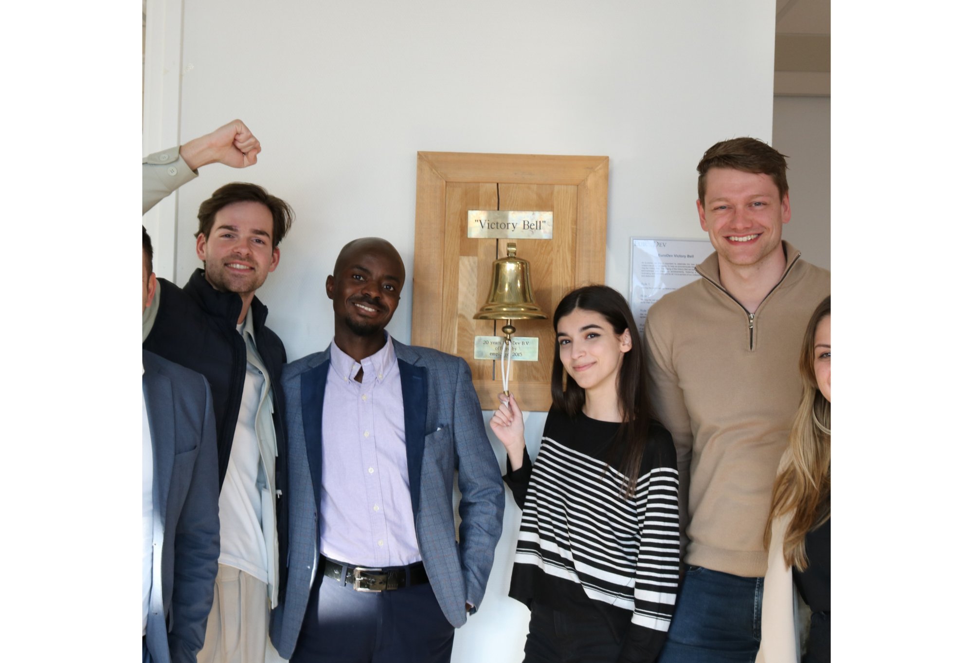 HRO Team ringing the bell